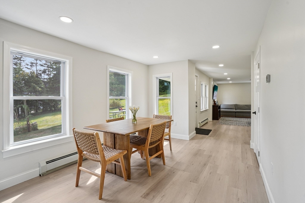 44 Richardson Corner Road Charlton, MA 01507 - Photo 11 of 31 a view of a dining room with furniture window and outside view