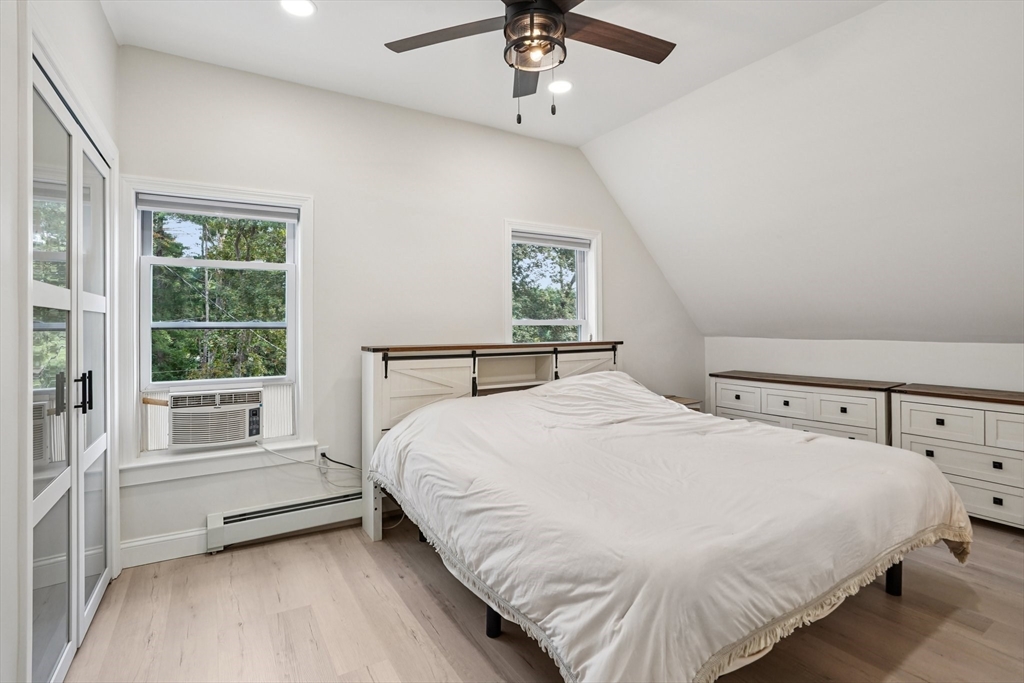 44 Richardson Corner Road Charlton, MA 01507 - Photo 15 of 31 a bedroom with a large bed and a window