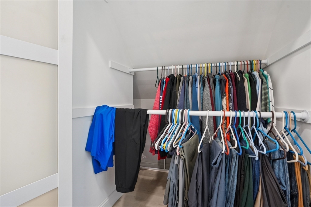 44 Richardson Corner Road Charlton, MA 01507 - Photo 17 of 31 a view of walk in closet with clothes