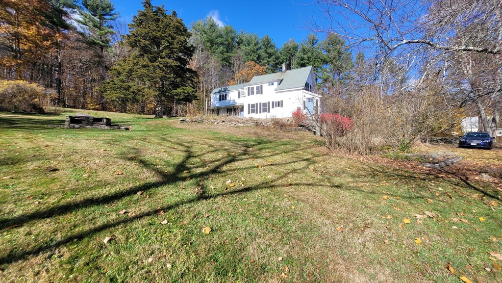 44 Richardson Corner Road Charlton, MA 01507 - Photo 3 of 31 a view of a houses with yard and trees