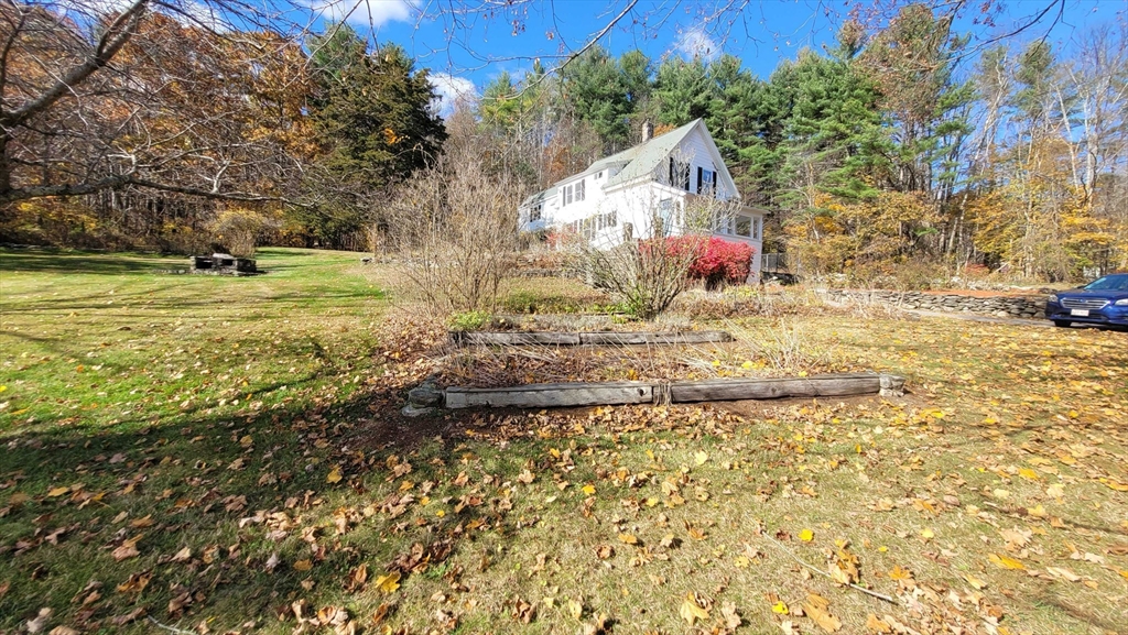 44 Richardson Corner Road Charlton, MA 01507 - Photo 4 of 31 a view of a yard with an trees