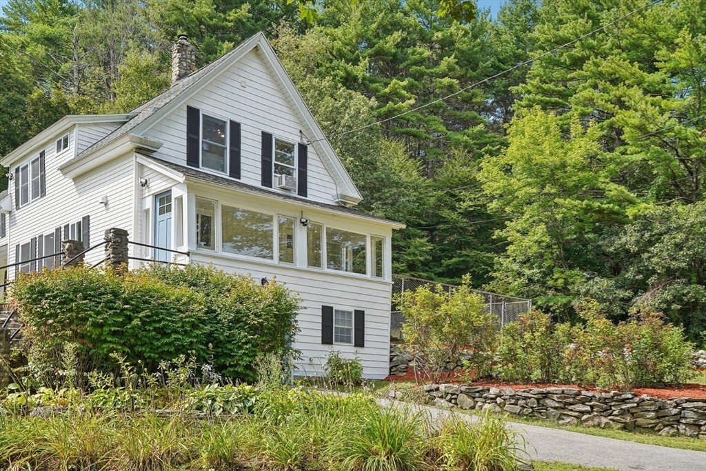 44 Richardson Corner Road Charlton, MA 01507 - Photo 5 of 31 a house view with a garden space