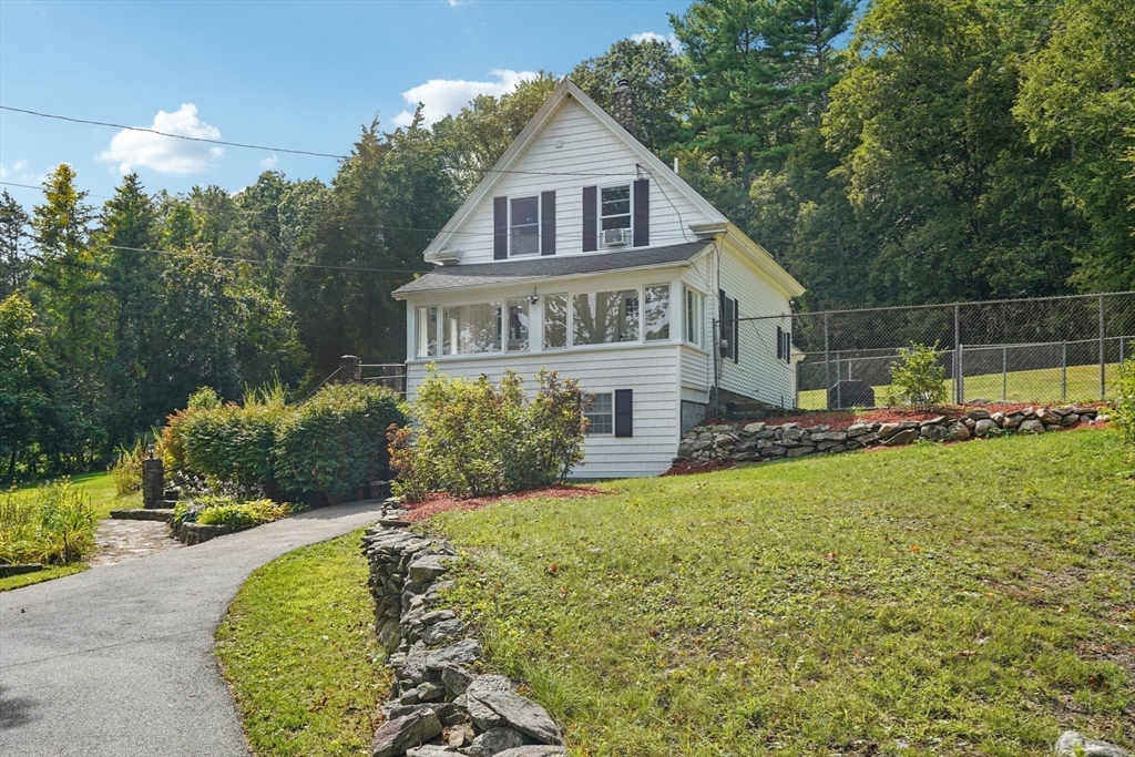 44 Richardson Corner Road Charlton, MA 01507 - Photo 6 of 31 a view of a house with backyard and garden