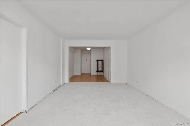 a bedroom with a large bed and a couch