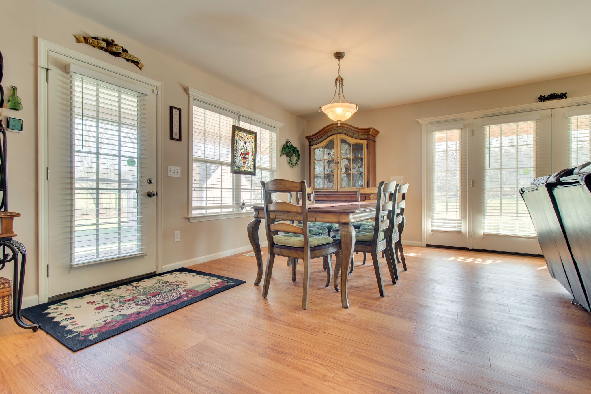 760 Greenvale Road Milton, TN 37118 - Photo 15 of 31 a view of a dining room with furniture a chandelier and wooden floor