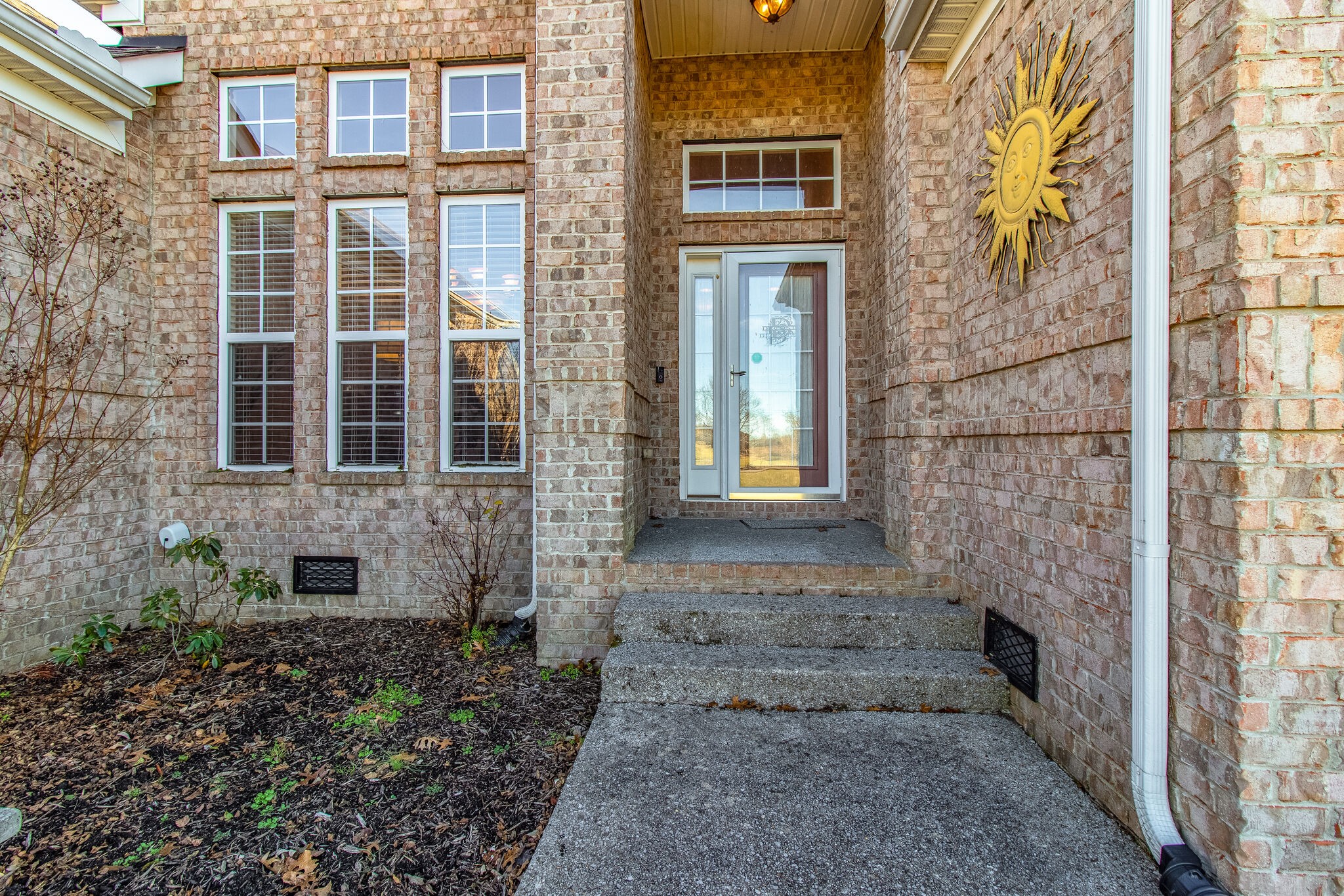 760 Greenvale Road Milton, TN 37118 - Photo 3 of 31 a view of a brick house with a yard