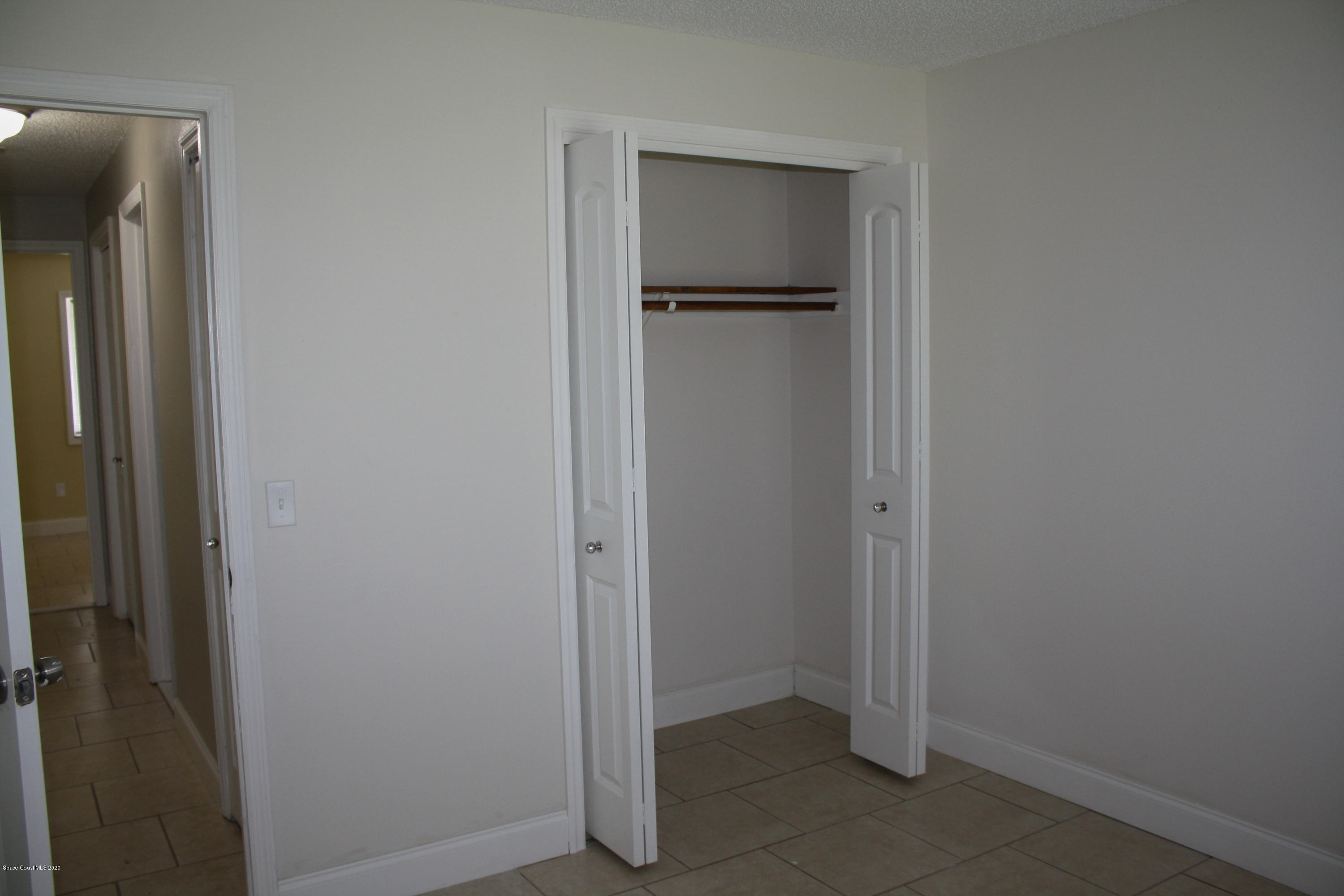 326 Riley Avenue Northeast Palm Bay, FL 32907 - Photo 21 of 43 a view of walk in closet