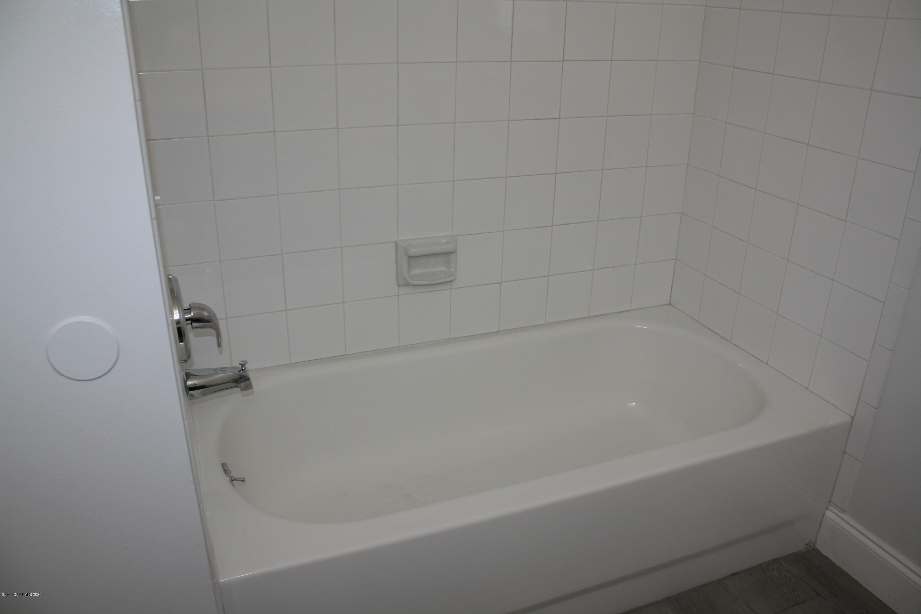 326 Riley Avenue Northeast Palm Bay, FL 32907 - Photo 24 of 43 a close up of a bathtub