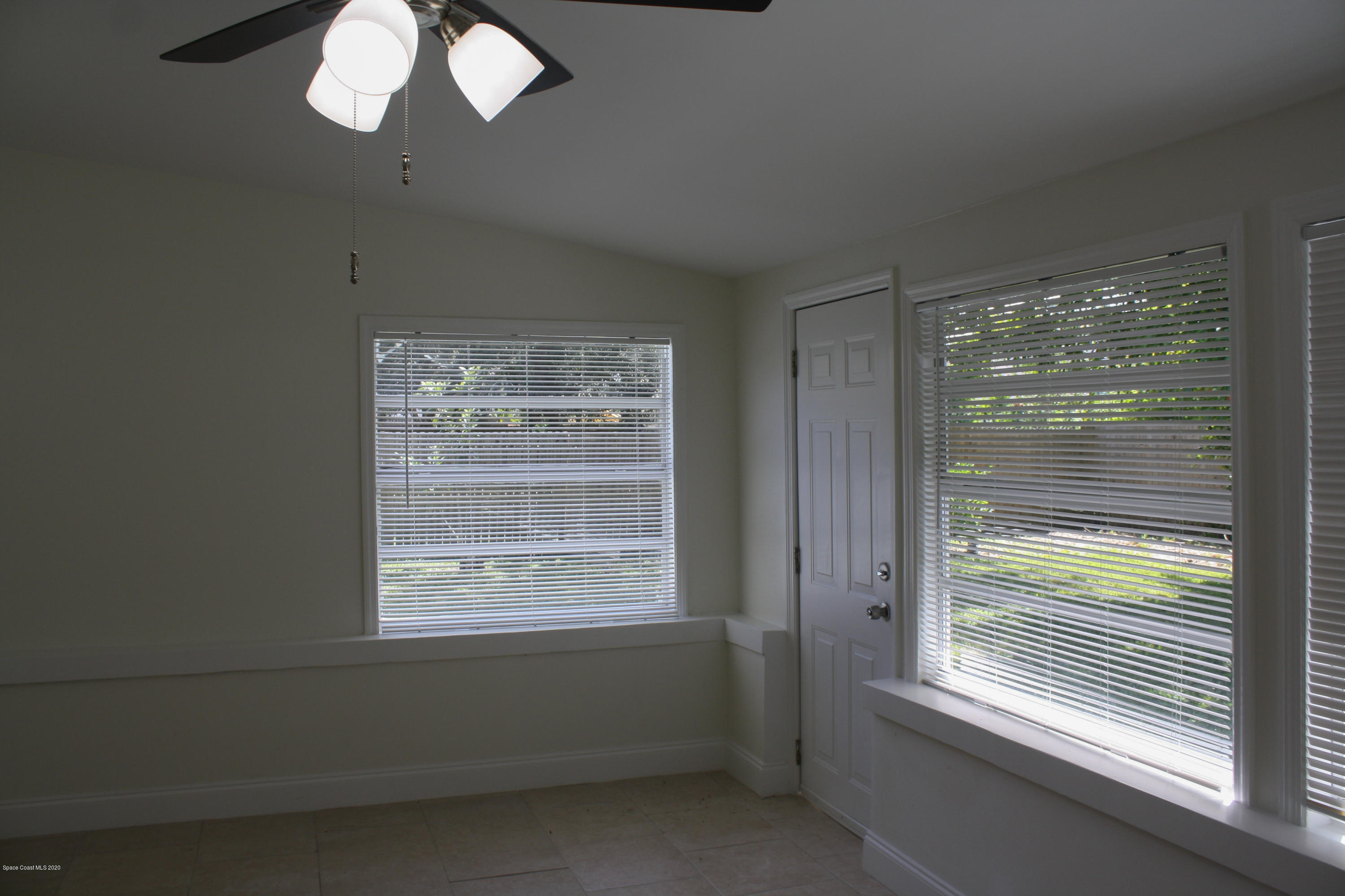 326 Riley Avenue Northeast Palm Bay, FL 32907 - Photo 32 of 43 a view of an empty room with a window