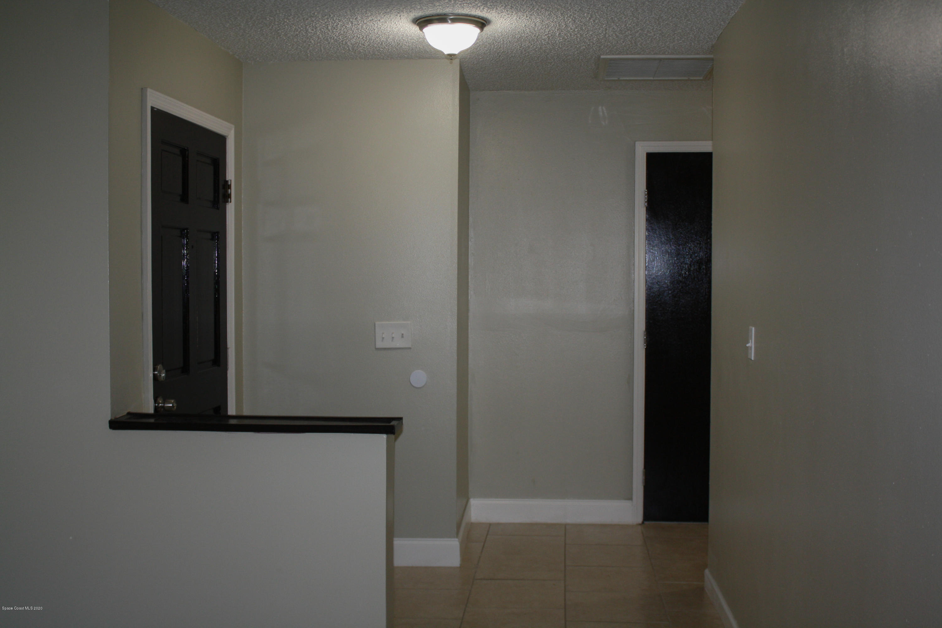 326 Riley Avenue Northeast Palm Bay, FL 32907 - Photo 5 of 43 a view of hallway