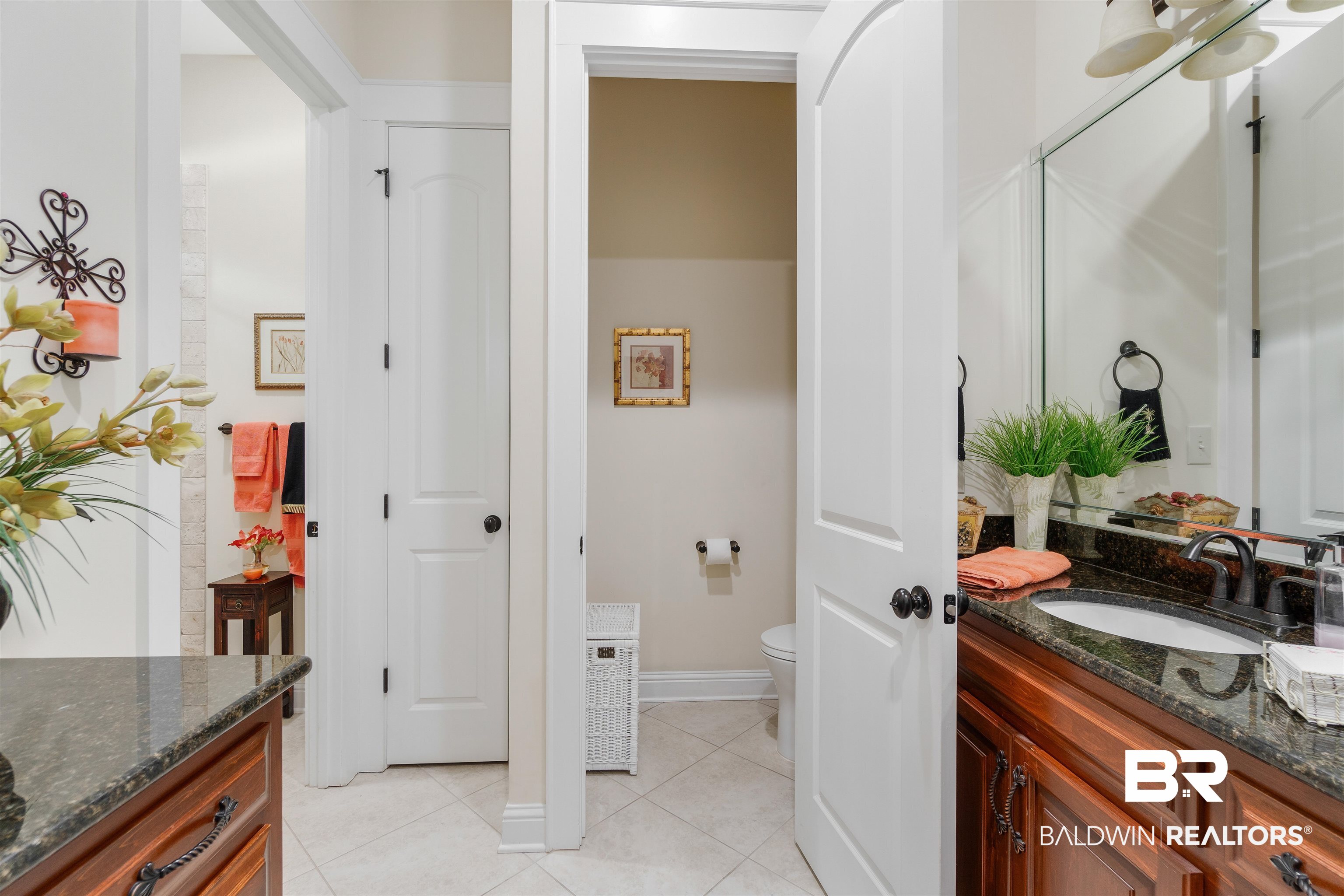 11281 Redfern Road Daphne, AL 36526 - Photo 51 of 80 Bathroom featuring tile patterned floors, toilet, and vanity