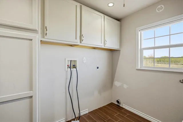 a view of storage and utility room with a sink