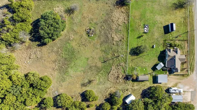 a view of a lounge chairs in the patio