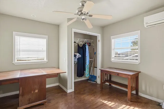 a workspace with furniture and window