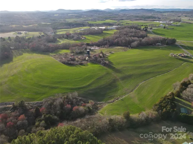 a view of lake with green space