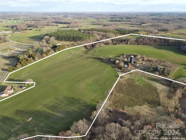 a view of a swimming pool with a balcony