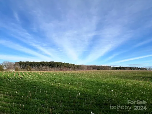 a view of lake with mountain in background