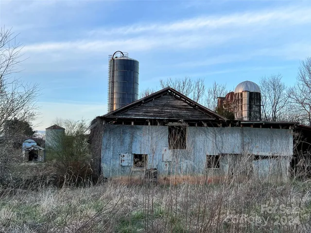 a view of a lake with a building in the background