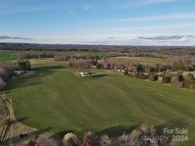 a view of a lake with a yard