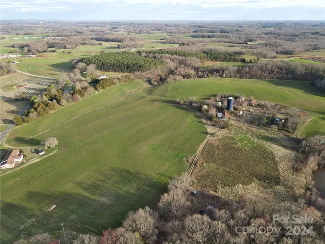 an aerial view of lake residential house and outdoor space