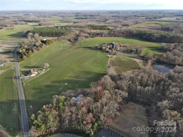 a view of a lake in middle of the town