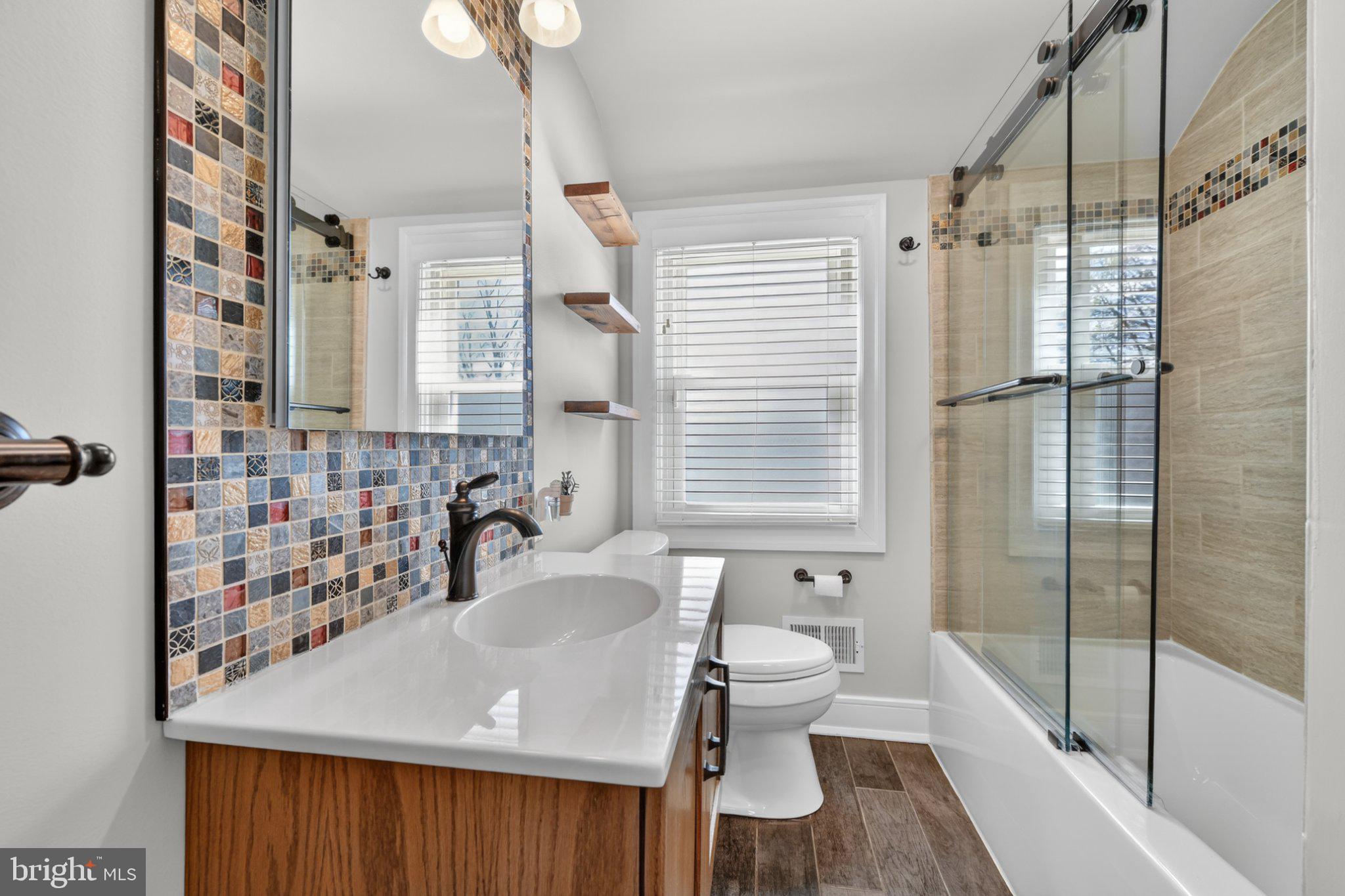 524 Harding Avenue Shillington, PA 19607 - Photo 13 of 37 Modern bathroom with vibrant tiles.