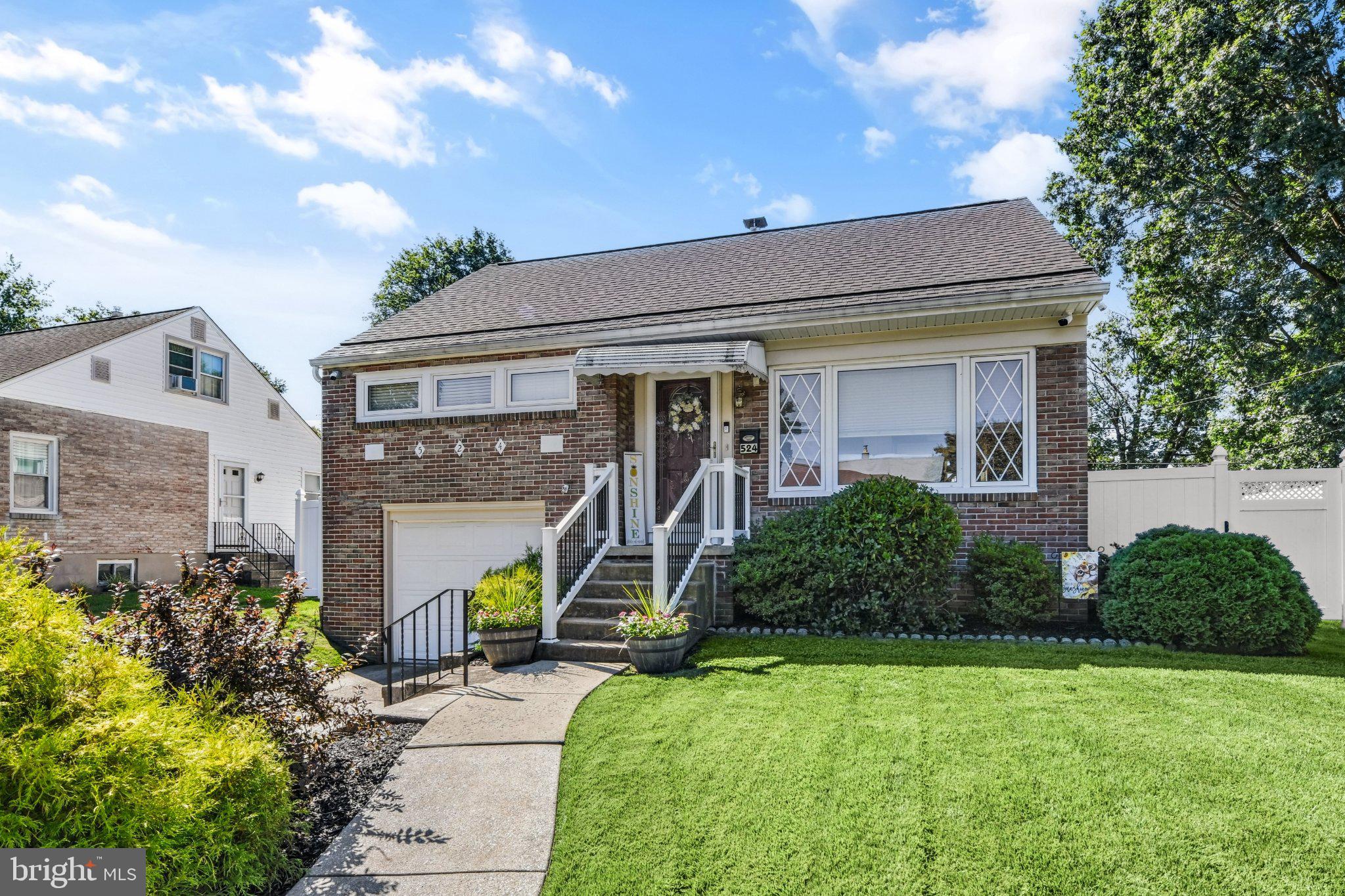 524 Harding Avenue Shillington, PA 19607 - Photo 36 of 37 Charming brick home with lush greenery.