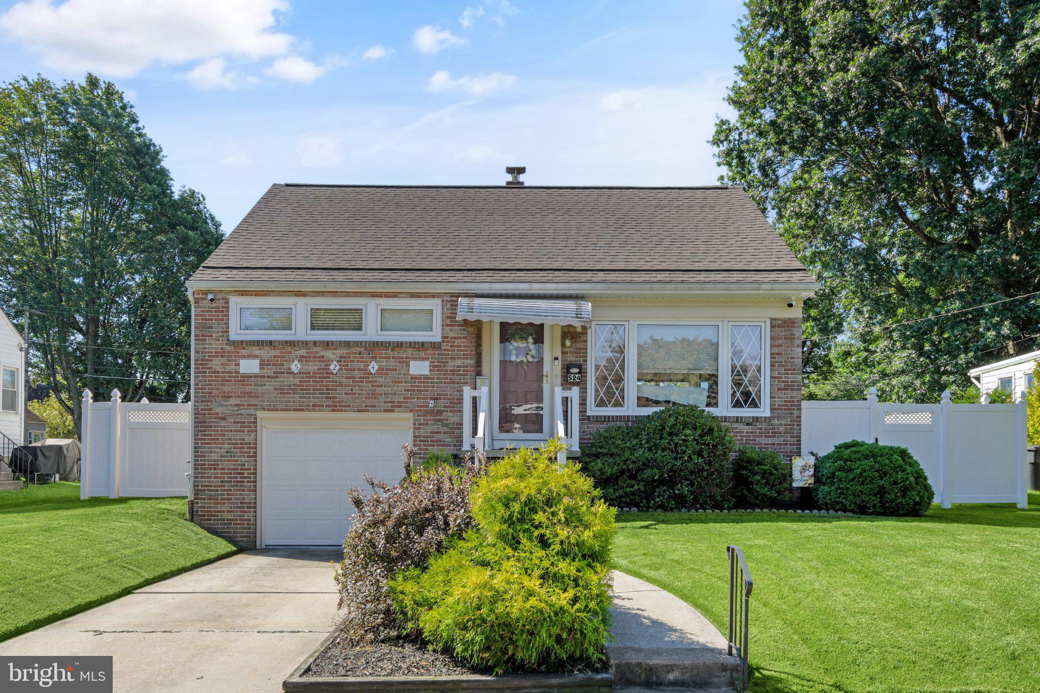 524 Harding Avenue Shillington, PA 19607 - Photo 37 of 37 Charming brick home with lush greenery.