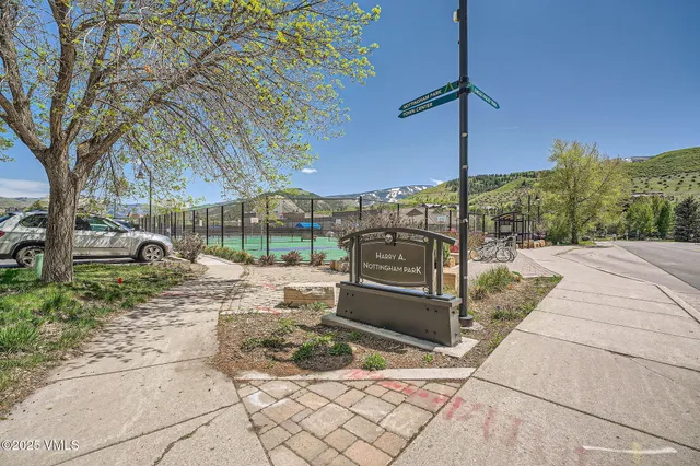 a view of a backyard with sitting area