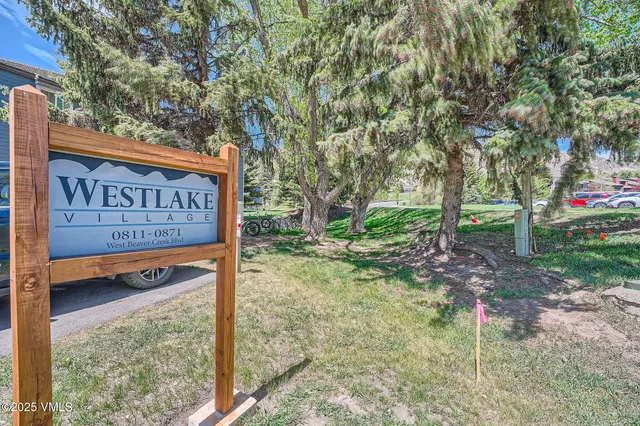 a view of outdoor space with shower and trees