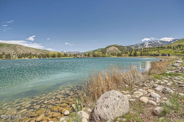 a view of lake with mountain