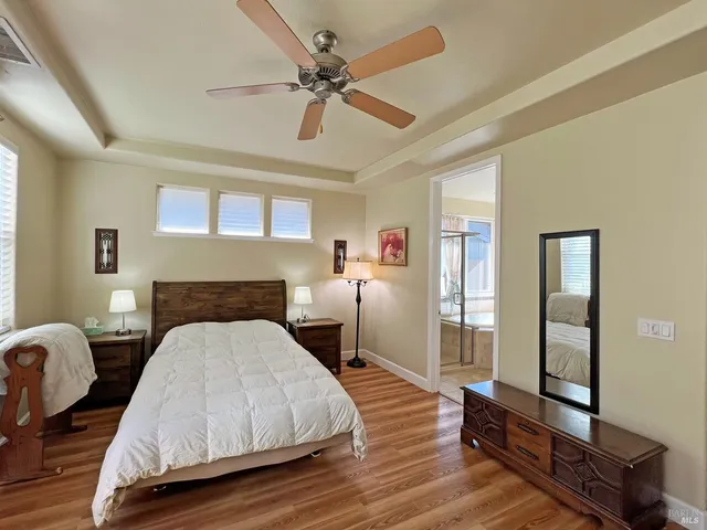 a bed room with a bed and a window