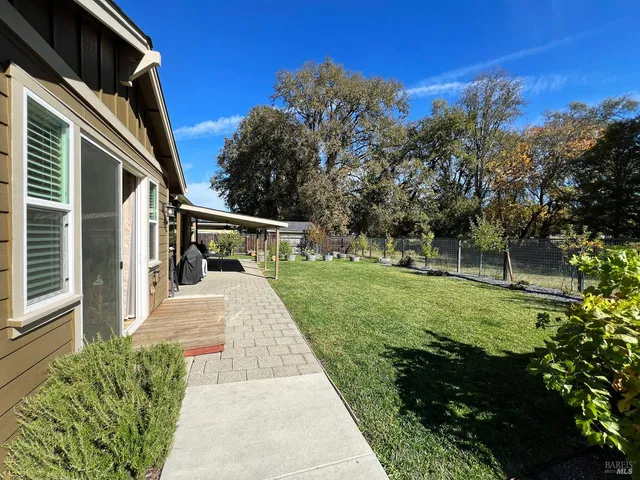 a house view with a garden space