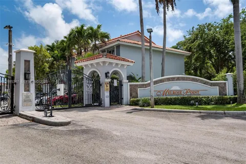 a swimming pool with outdoor seating and yard