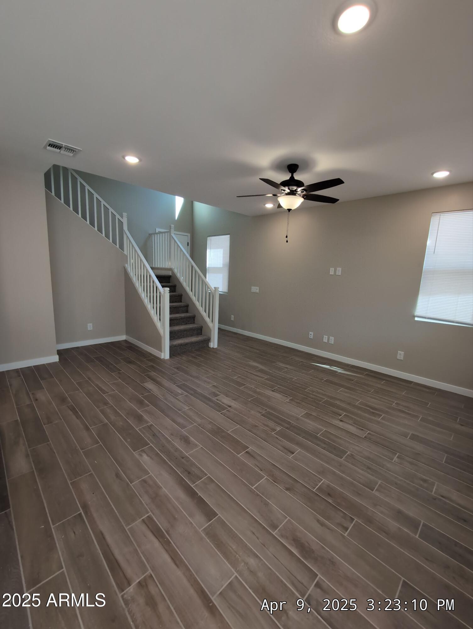 4514 South Pasteur Mesa, AZ 85212 - Photo 13 of 43 wooden floor in an empty room with a window