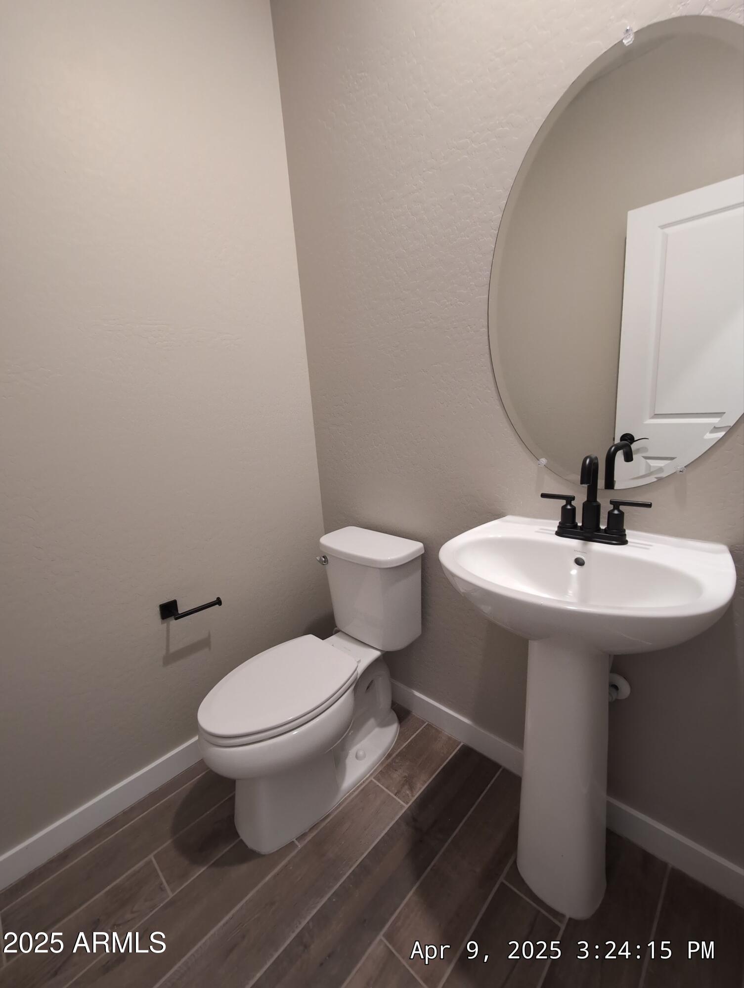 4514 South Pasteur Mesa, AZ 85212 - Photo 17 of 43 a bathroom with a sink toilet and a mirror