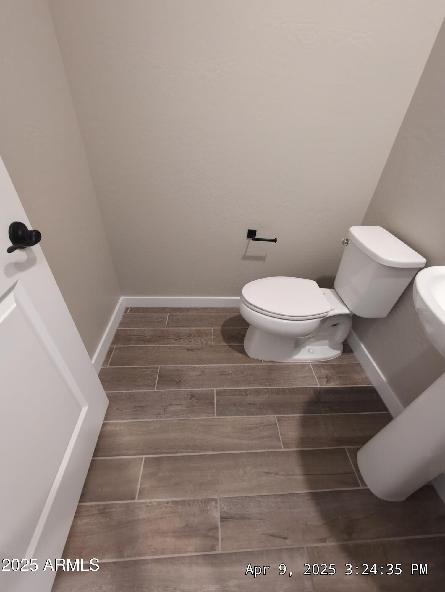 4514 South Pasteur Mesa, AZ 85212 - Photo 18 of 43 a bathroom with a toilet and a sink