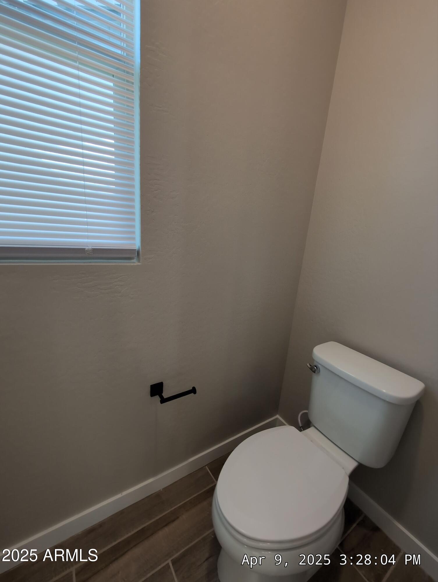 4514 South Pasteur Mesa, AZ 85212 - Photo 28 of 43 a white toilet sitting next to a window
