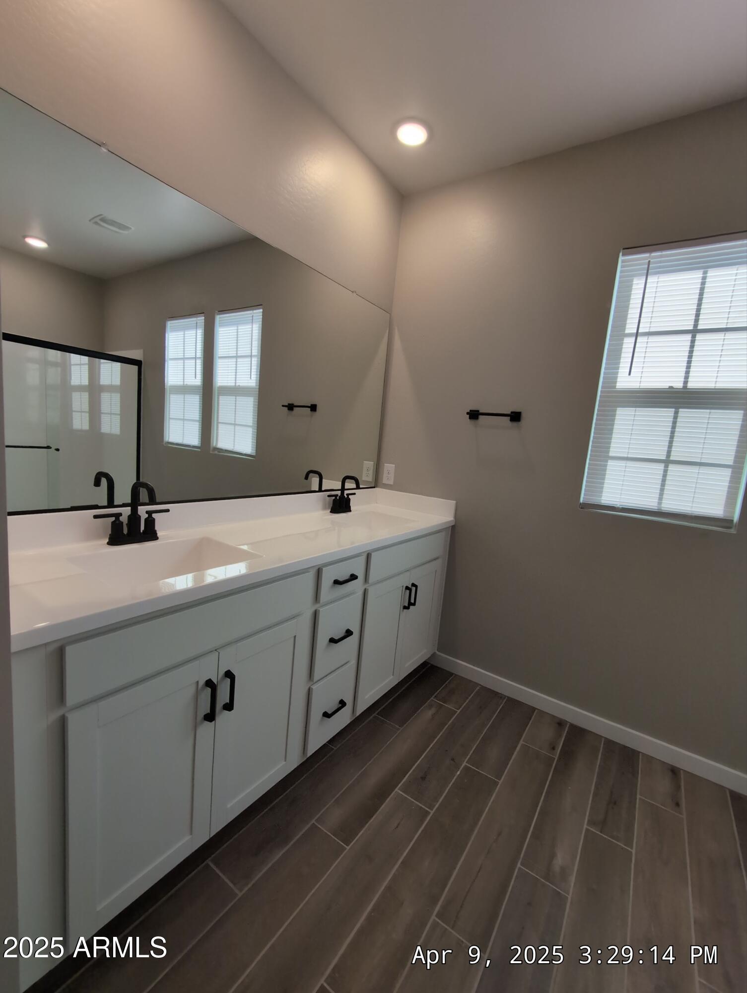 4514 South Pasteur Mesa, AZ 85212 - Photo 29 of 43 a bathroom with a sink and a mirror