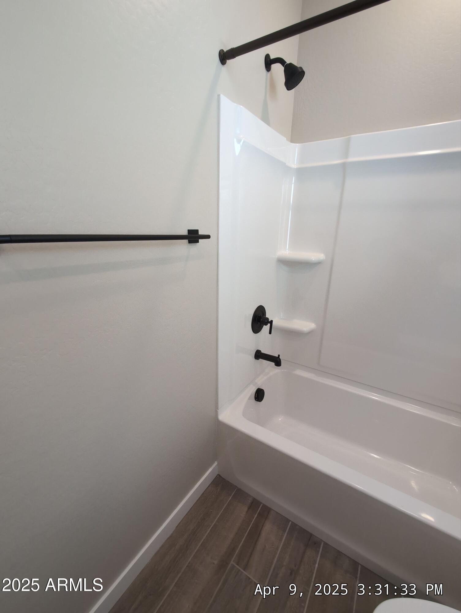 4514 South Pasteur Mesa, AZ 85212 - Photo 36 of 43 a bathroom with a bathtub and shower