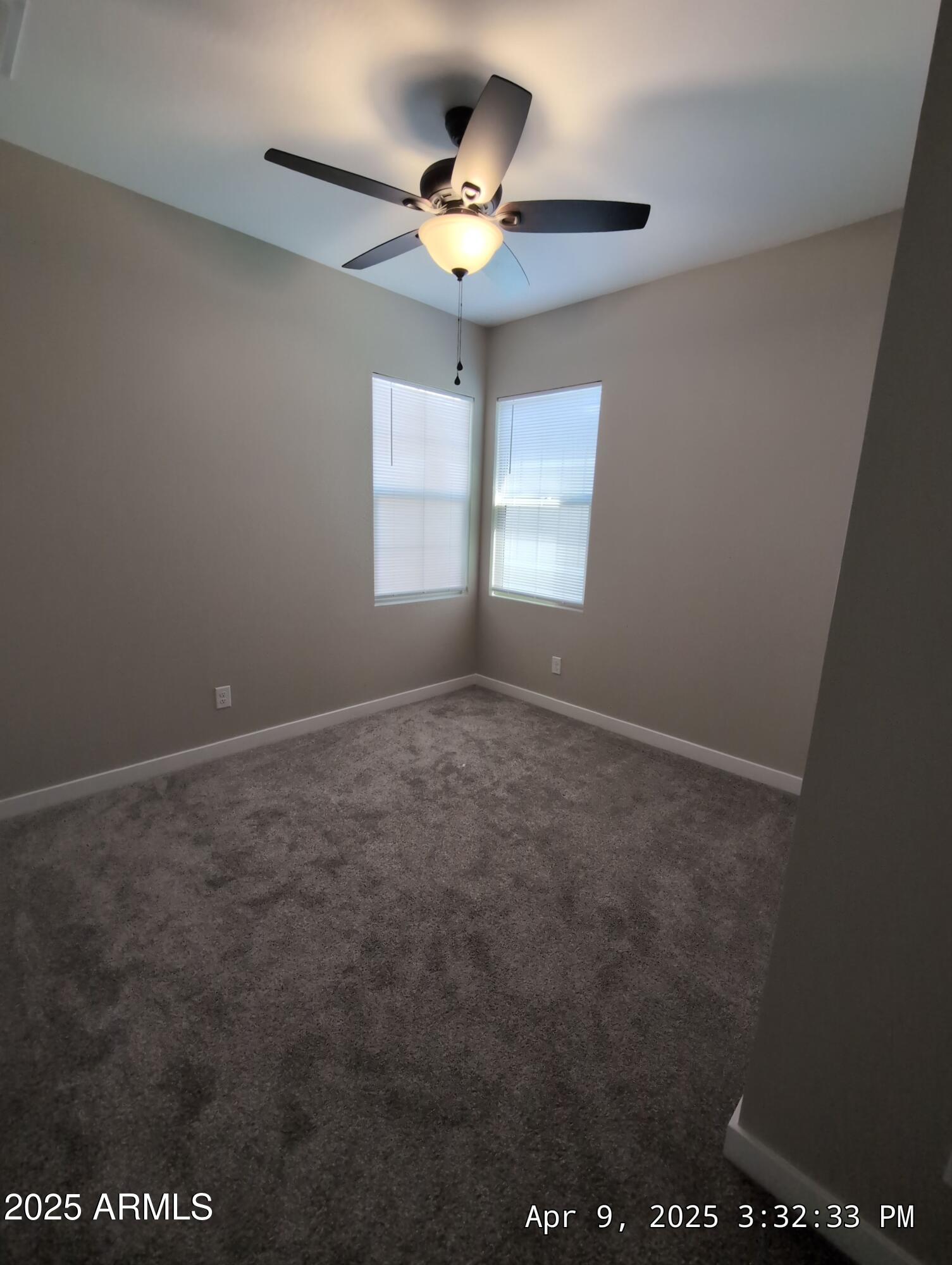 4514 South Pasteur Mesa, AZ 85212 - Photo 39 of 43 en empty room with windows and ceiling fan