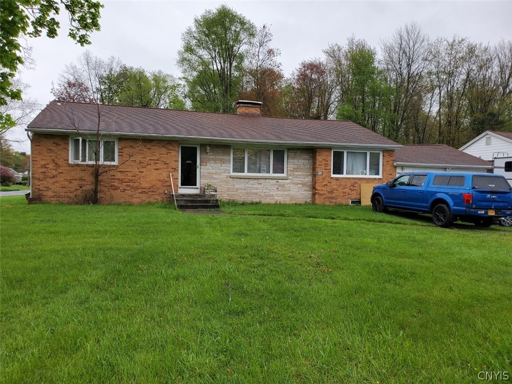 Welcome to 210 Tolbert. This 2000+ sq. ft. brick r