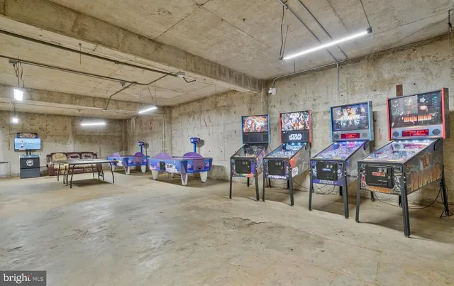 a kitchen with a stove a sink and a refrigerator