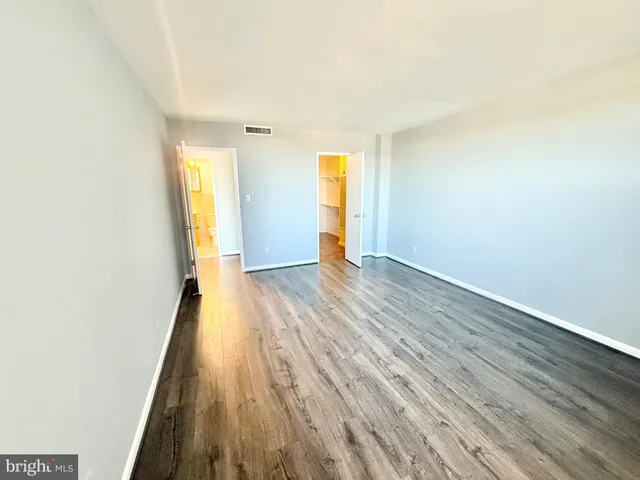 a view of livingroom with wooden floor