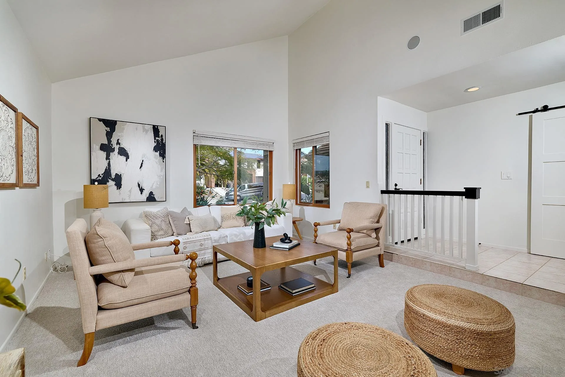 7627 Reposado Drive Carlsbad, CA 92009 - Photo 2 of 54 a living room with furniture