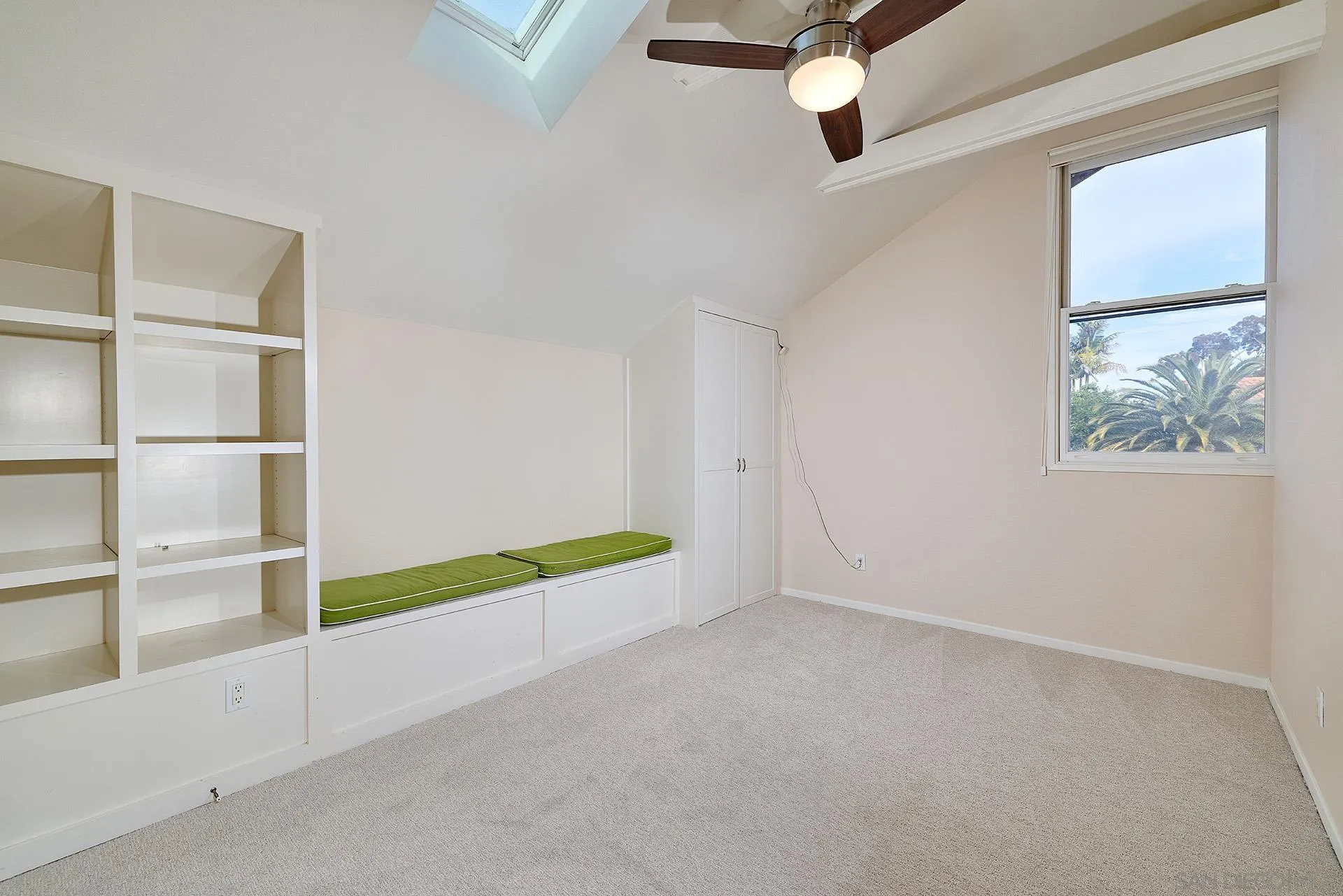 7627 Reposado Drive Carlsbad, CA 92009 - Photo 25 of 54 a view of an empty room with a window