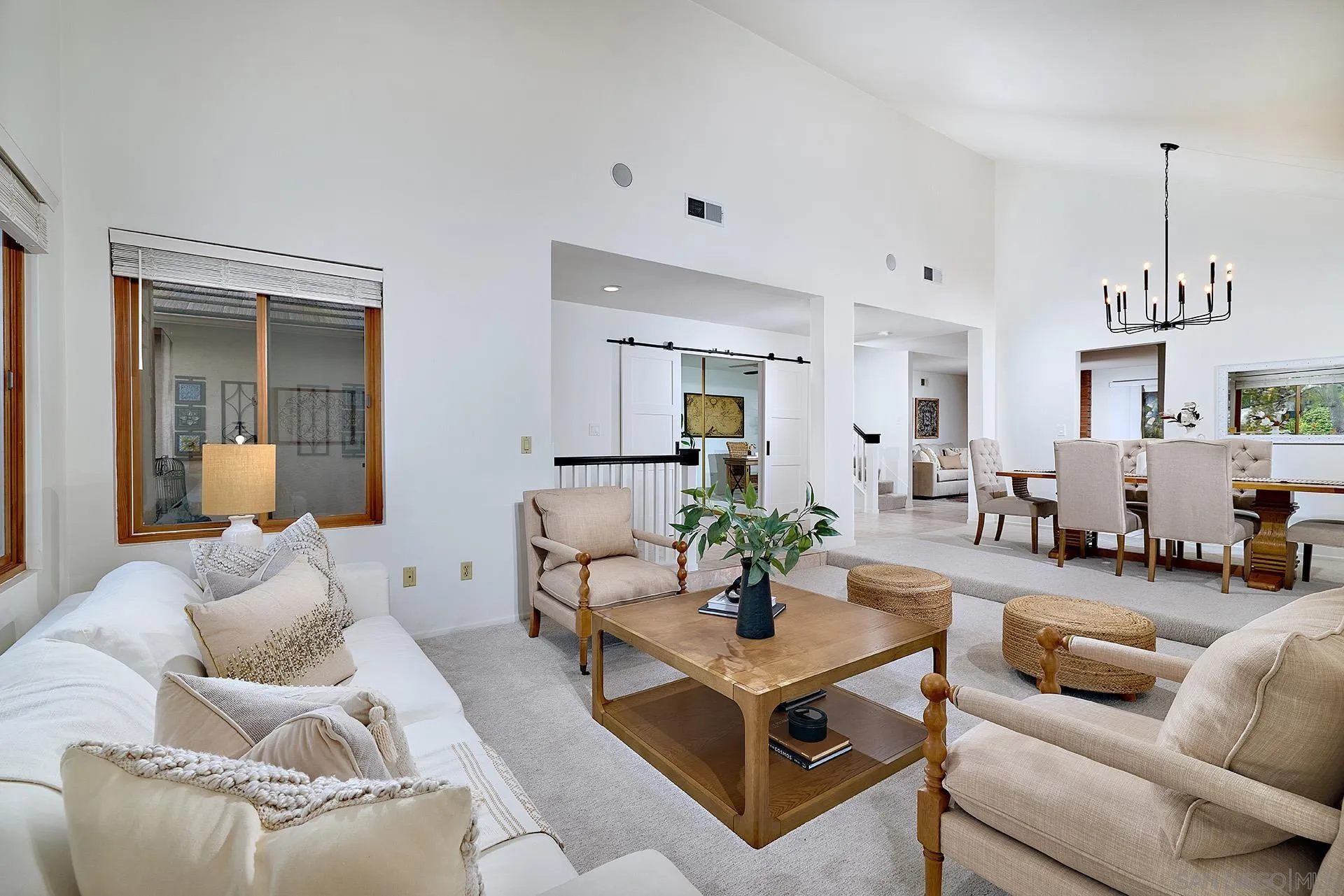 7627 Reposado Drive Carlsbad, CA 92009 - Photo 3 of 54 a living room with furniture and wooden floor