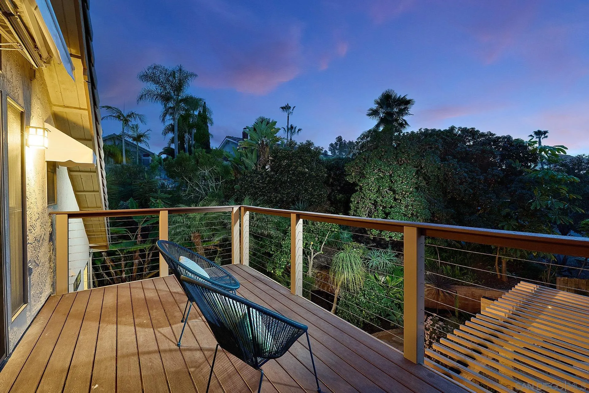 7627 Reposado Drive Carlsbad, CA 92009 - Photo 33 of 54 a view of balcony with wooden floor and fence
