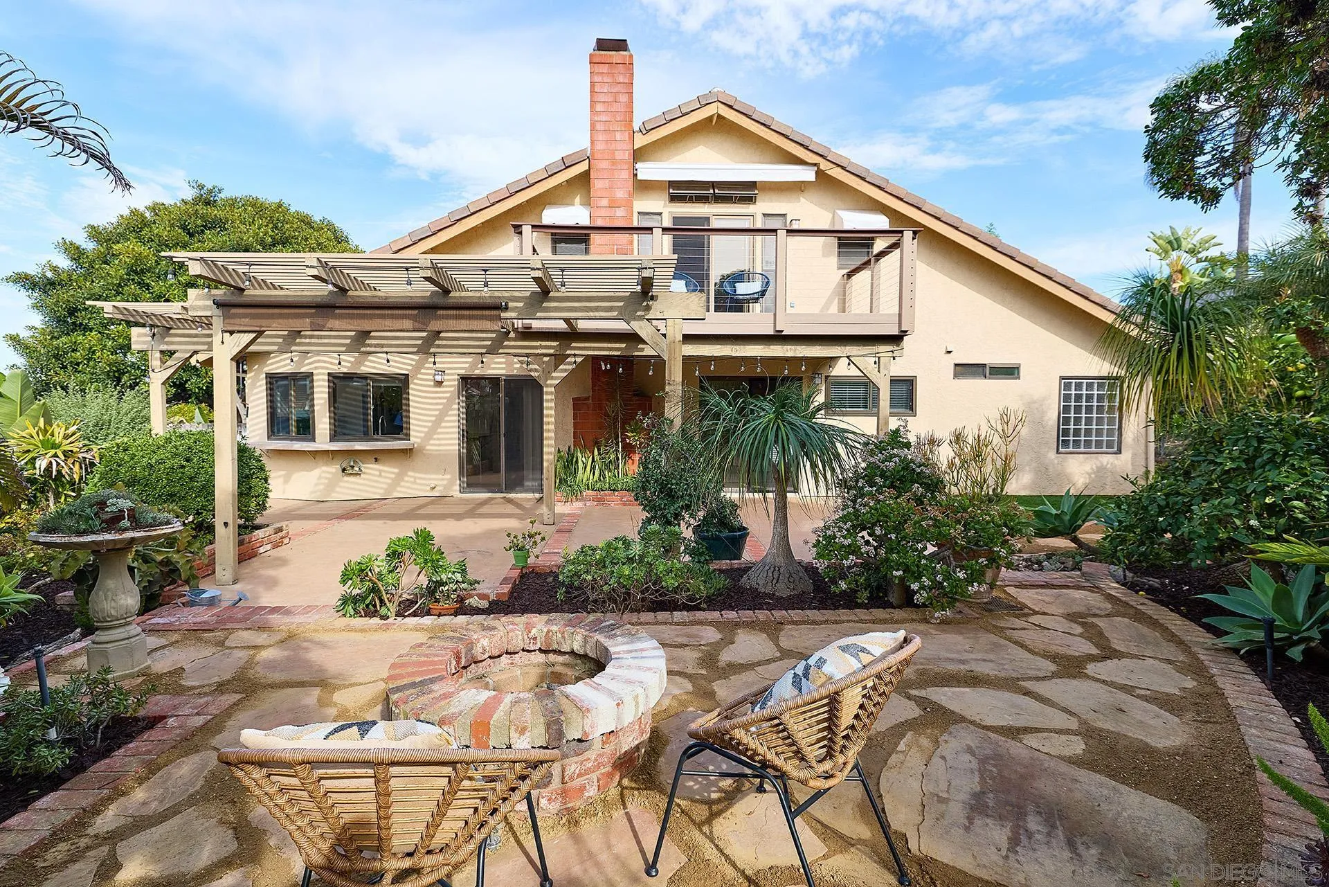 7627 Reposado Drive Carlsbad, CA 92009 - Photo 36 of 54 a view of house with a outdoor space