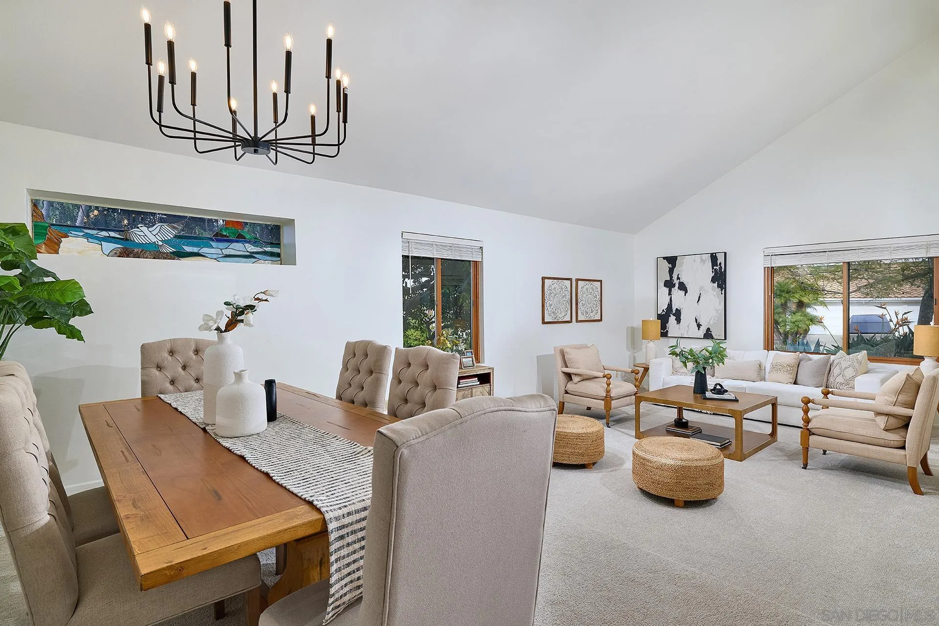 7627 Reposado Drive Carlsbad, CA 92009 - Photo 4 of 54 a living room with furniture and kitchen view